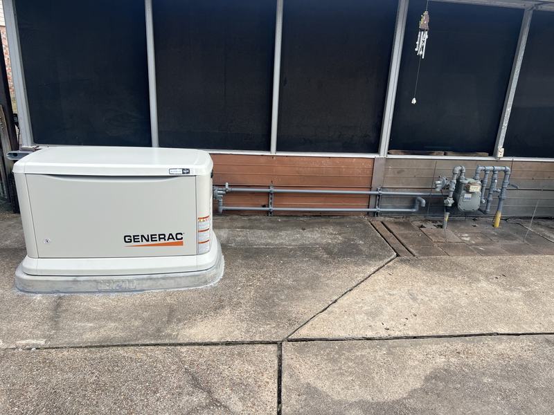 Generac standby generator with the completed natural gas line connection